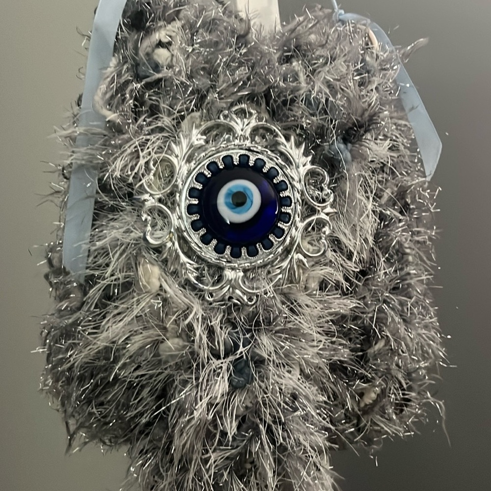 Perla Lichi bag with evil eye accent